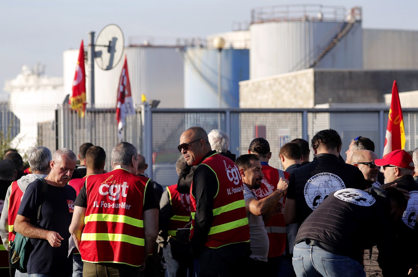 Workers from TotalEnergies and Esso ExxonMobil attend a protest called by CGT union outside Esso refinery in Fos-Sur-Mer, France, Oct. 11, 2022. (EPA Photo)