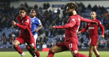 Mohamed Salah (R) of Liverpool in action during the UEFA Champions League group A football match between Rangers FC and Liverpool FC, Glasgow, Britain, Oct. 12, 2022. (EPA Photo)