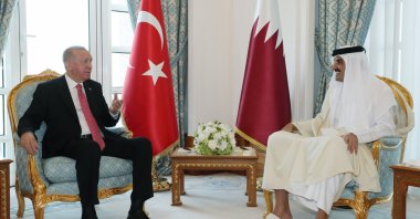 President Recep Tayyip Erdoğan (L) and the emir of Qatar, Sheikh Tamim bin Hamad Al Thani, during their meeting at the Amiri Diwan Palace in Doha, Qatar, Dec. 7, 2021. (EPA File Photo)