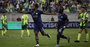 Fenerbahçe's Michy Batshuayi celebrates scoring his team's second goal with teammate Enner Valencia in Group B match against AEK Larnaca at AEK Arena, in Larnaca, Greek Cyprus, Oct. 13, 2022. (Reuters Photo)