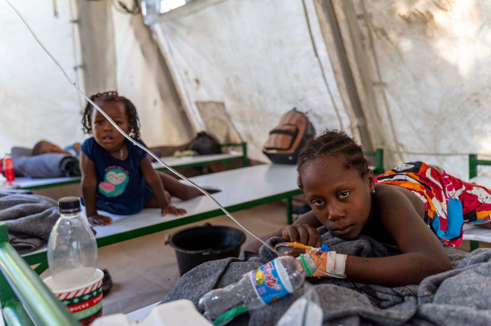 Children showing symptoms of cholera receive treatment at a clinic run by Doctors Without Borders in Cité Soleil, Port-au-Prince, Haiti, Oct. 7, 2022. (AFP Photo)