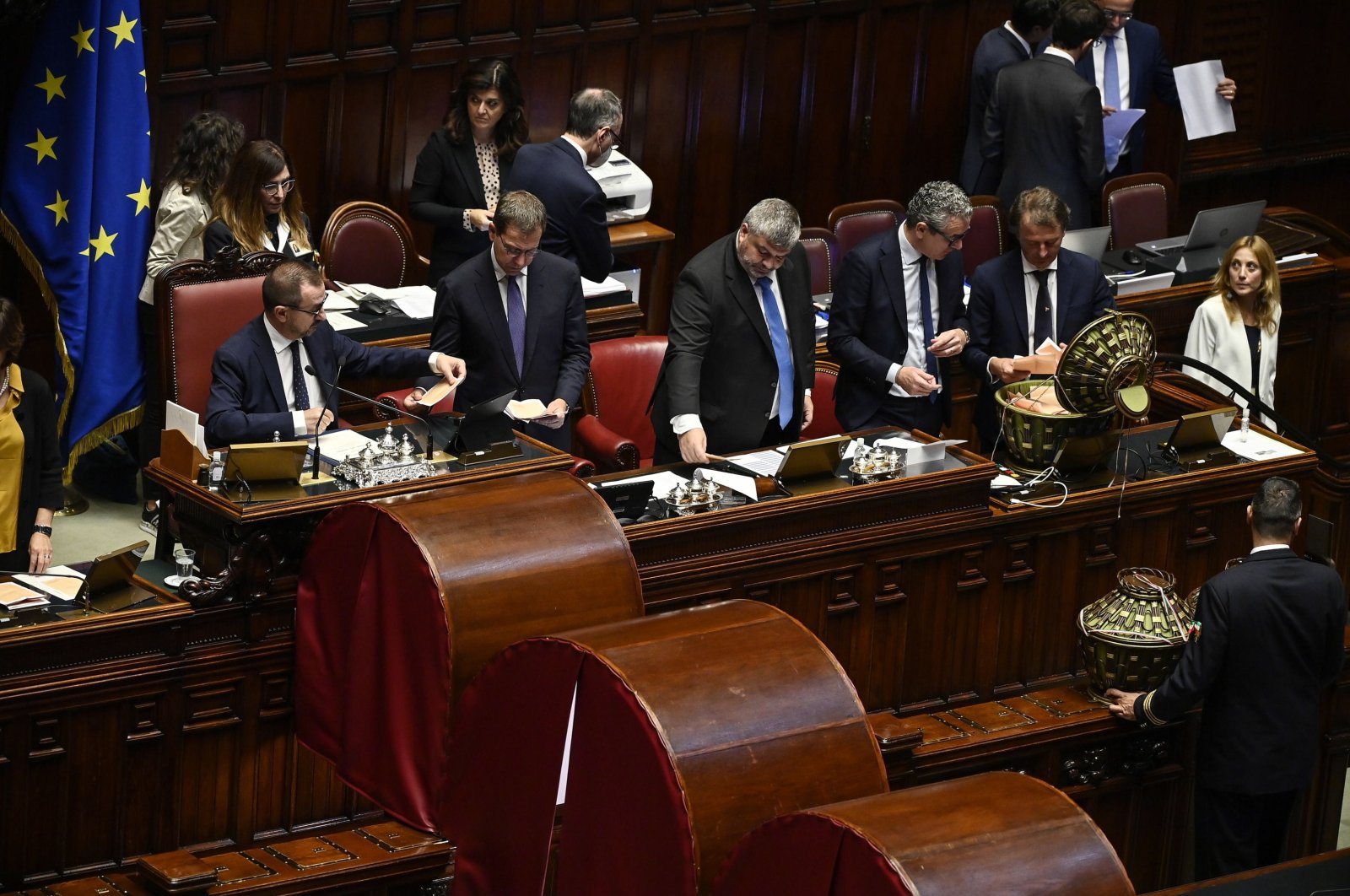 Members count the votes during the election of the speaker of the Italian chamber of deputies, Rome, Italy, Oct. 13 2022. (EPA Photo)