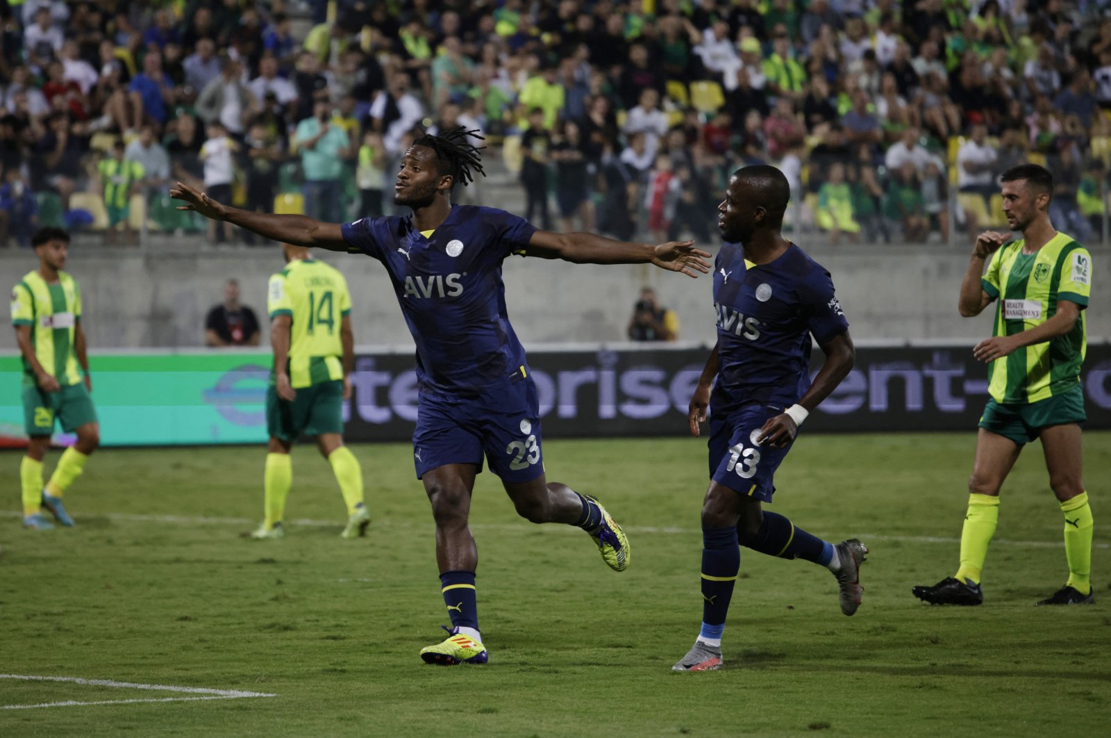 Fenerbahçe&#039;s Michy Batshuayi celebrates scoring his team&#039;s second goal with teammate Enner Valencia in Group B match against AEK Larnaca at AEK Arena, in Larnaca, Greek Cyprus, Oct. 13, 2022. (Reuters Photo)