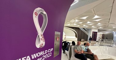 World Cup branding is seen as people wait at a metro station, Doha, Qatar, Oct. 13, 2022. (REUTERS Photo)