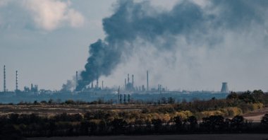Black smoke is seen near the Slovianska heat power station in the Donetsk region, Ukraine, Oct. 13, 2022. (AFP Photo)