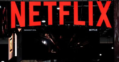 Signage at the Netflix booth is seen on the convention floor at Comic-Con International in San Diego, California, U.S., July 21, 2022. (Reuters Photo)