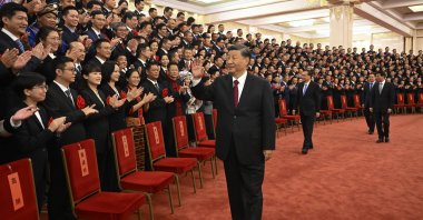 Chinese President Xi Jinping (C) meets with representatives of model civil servants during a national award ceremony held at the Great Hall of the People, Beijing, China, Aug. 30, 2022. (AP Photo)