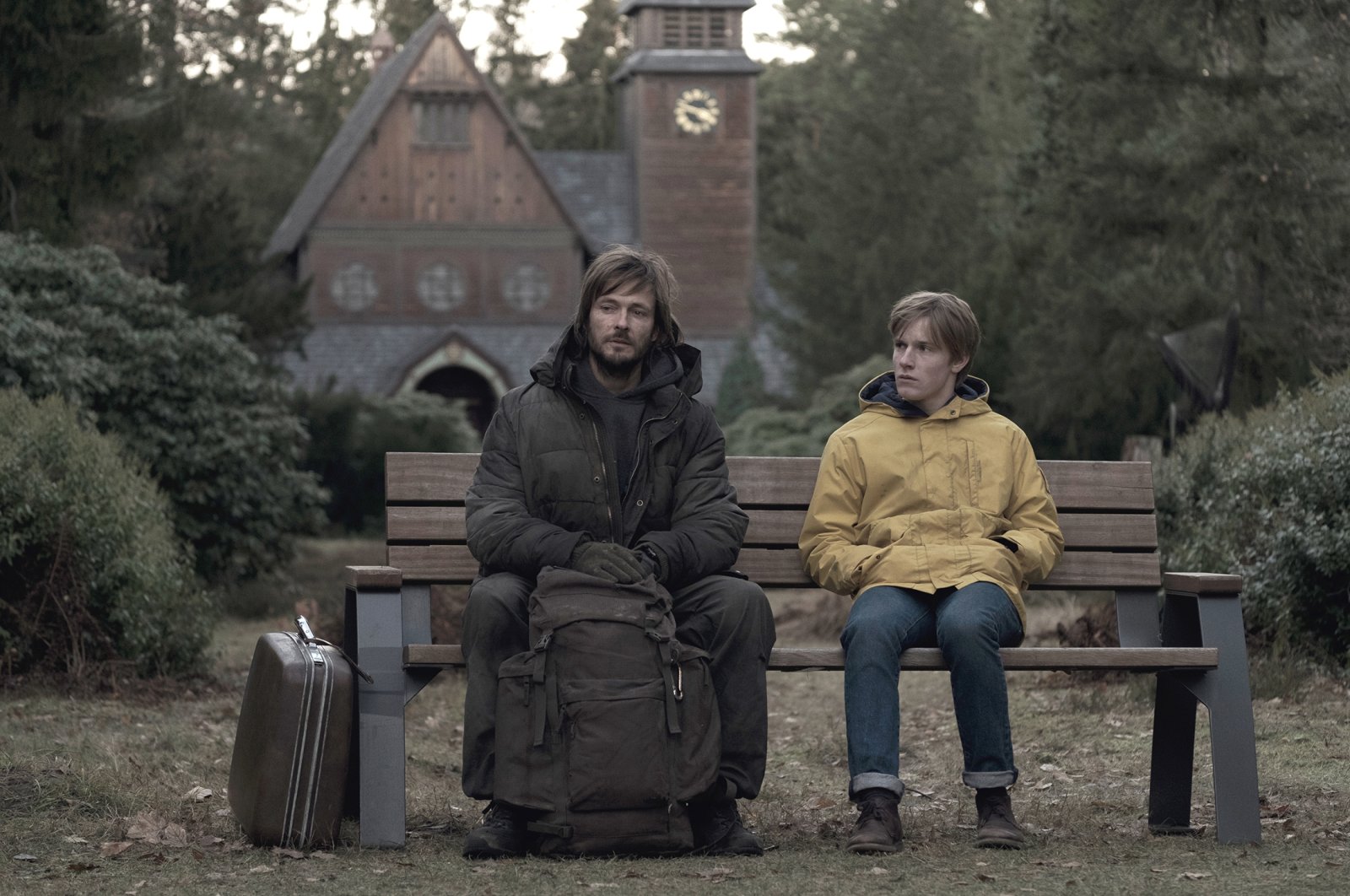 Andreas Pietschmann (L) and Louis Hofmann, in a scene from the series &quot;Dark.&quot; (Netflix via dpa) 