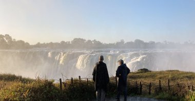 It is best to put on a raincoat when standing close to the falls, Victoria Falls, Zimbabwe, July 6, 2022. (dpa Photo)