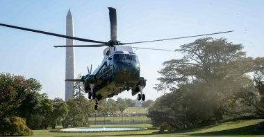 Pollen from a tree is swept through the air as Marine One, with U.S. President Biden on board, approaches the South Lawn of the White House, Washington, D.C., U.S., Oct. 10, 2022. (AFP Photo)