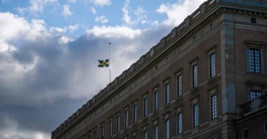 The Swedish flag flies at half-mast atop the Royal Palace in Stockholm, Sweden, Sept. 9, 2022. (AFP Photo)