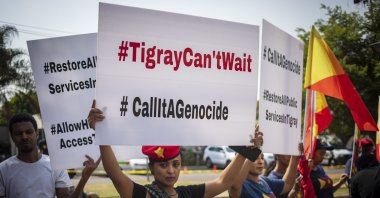 Members of the Tigrayan Community in South Africa (TICASA) gather outside the United States Embassy calling for the end to their claimed genocide of the Tigray communities in Ethiopia, Pretoria, South Africa, Oct. 12, 2022. (EPA Photo)