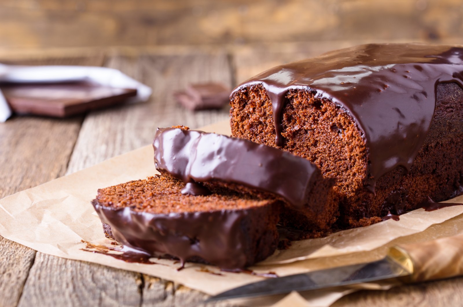 Homemade chocolate cake on baking paper. (Shutterstock Photo)