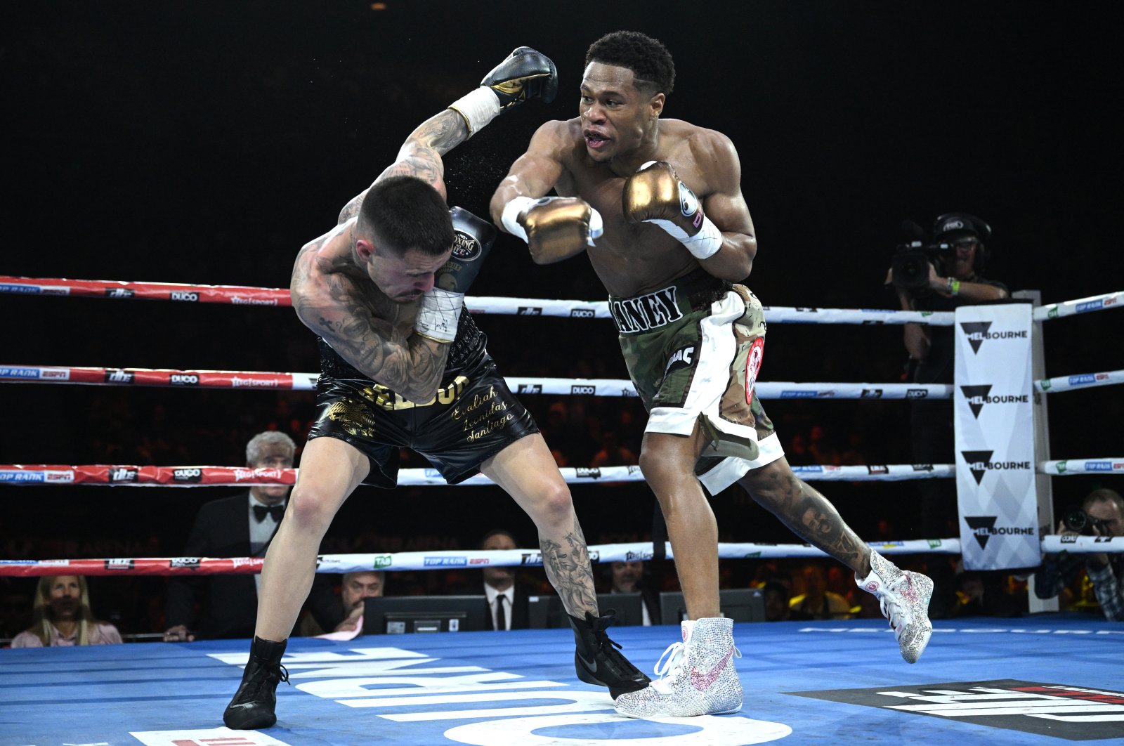 Australia&#039;s George Kambosos (L) and Devin Haney (R) of the United States in action during the World Lightweight Title re-match at Rod Laver Arena. Melbourne, Australia, Oct. 16 2022. (EPA Photo)