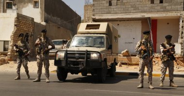 Libyan military forces are seen stationed on a street in the country’s capital Tripoli, Libya, July 22, 2022. (AP Photo)