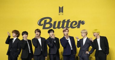 Members of South Korean K-pop band BTS pose for photographers ahead of a press conference to introduce their single "Butter" in Seoul, South Korea, May 21, 2021. (Reuters Photo)