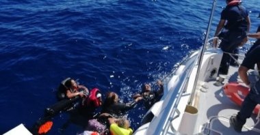 Turkish Coast Guard units rescue irregular migrants pushed back by Greece off Aegean Sea on Sept. 13, 2022. (Interior Ministry Handout)