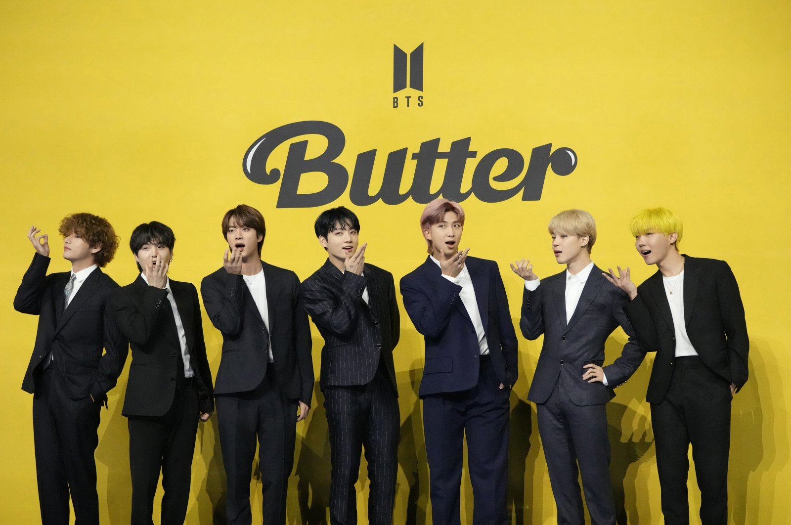 Members of South Korean K-pop band BTS pose for photographers ahead of a press conference to introduce their single &quot;Butter&quot; in Seoul, South Korea, May 21, 2021. (Reuters Photo)