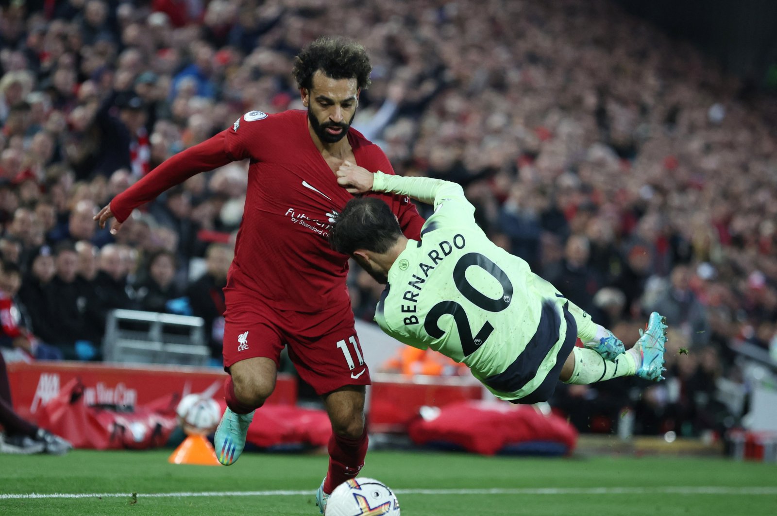 Liverpool&#039;s Mohamed Salah in action with Manchester City&#039;s Bernardo Silva in a Premier League match between Liverpool and Manchester City at the Anfield stadium, Liverpool, Britain, Oct. 16, 2022 (Reuters Photo)