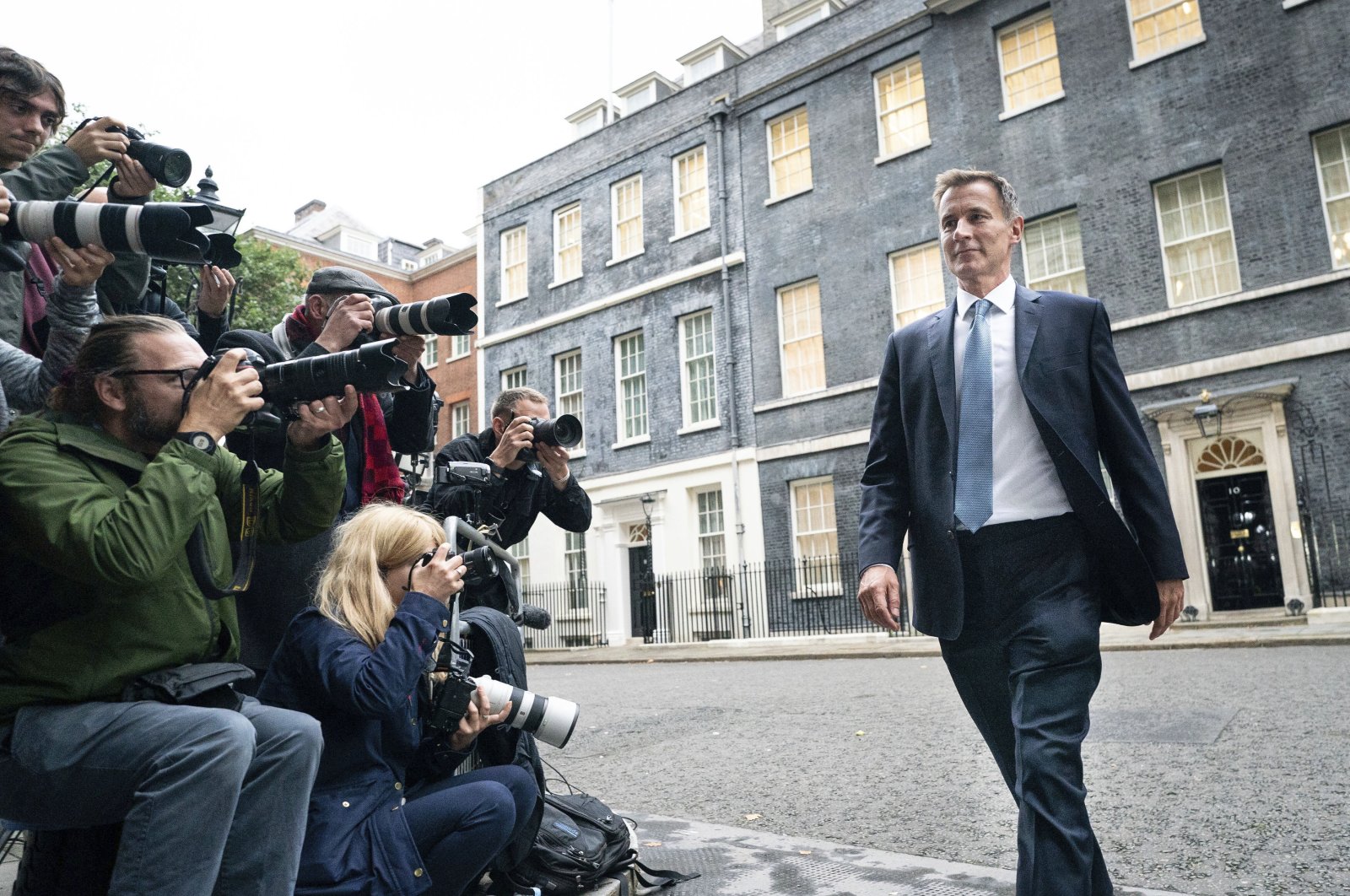 Jeremy Hunt leaves 10 Downing Street after he was appointed Chancellor of the Exchequer following the resignation of Kwasi Kwarteng, London, Britain, Oct. 14, 2022. (AP Photo)