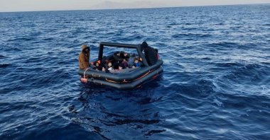 A boat carrying irregular migrants is rescued by Turkish coast guard units off the coast of Muğla province&#039;s Bodrum district, Türkiye, Jan. 4, 2022. (IHA Photo)