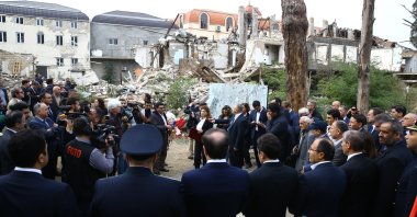 Residents and officials gather to honor the civilians killed in Armenian attacks on Azerbaijan's second-largest city during the 2020 Karabakh conflict, Ganja, Azerbaijan, Oct. 17, 2022. (AA Photo)