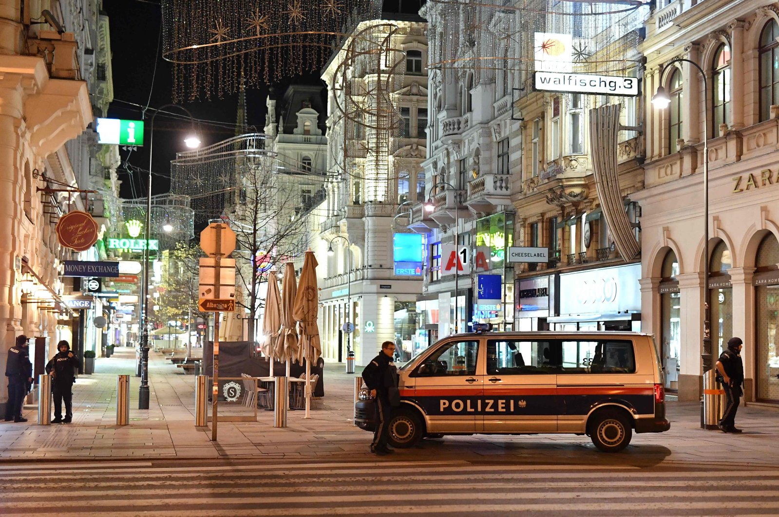 Armed police officers stand guard in a shopping street in the center of Vienna, following a shooting, Vienna, Austria, Nov. 2, 2020. (AFP Photo)