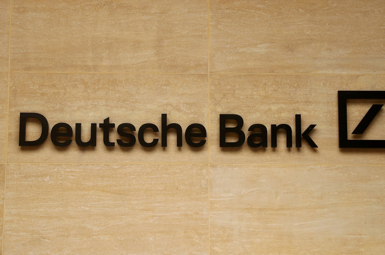 The logo of Deutsche Bank is pictured on an office of the company in London, Britain July 8, 2019. (Reuters File Photo)
