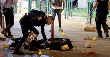 The body of Palestinian man Udai Tamimi lies at a checkpoint after being killed at Israeli settlement Maale Adumim, near East Jerusalem, Palestine, Oct. 19, 2022. (EPA Photo)