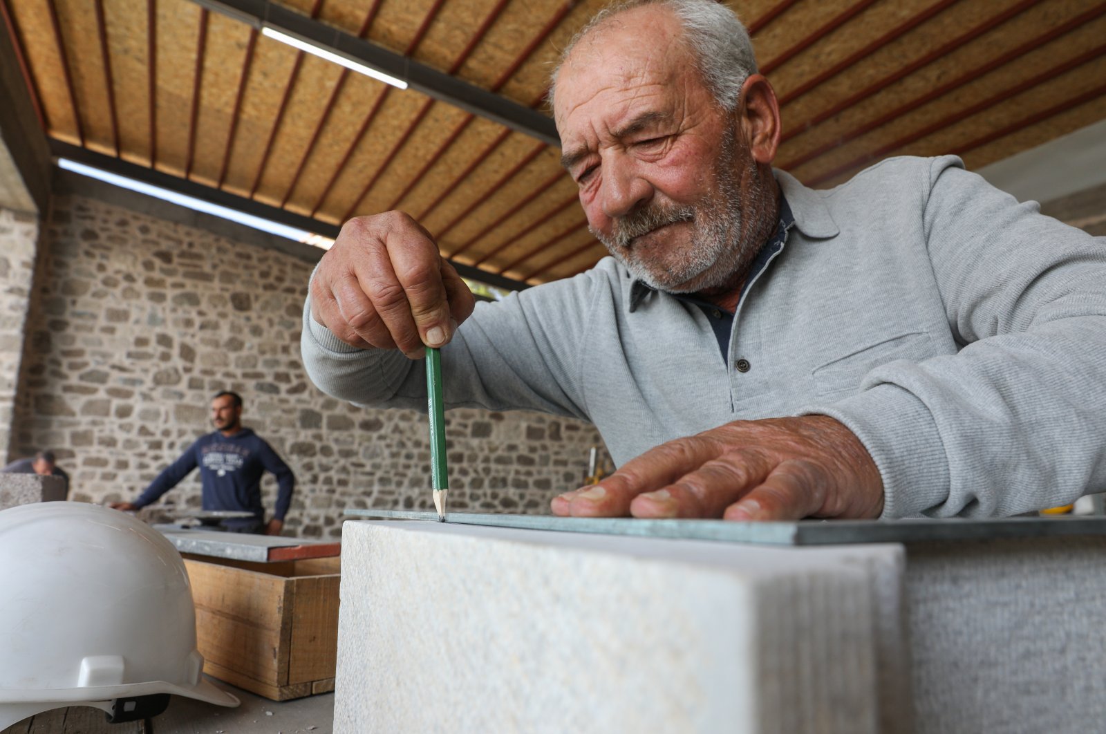 The artifacts unearthed during the excavations carried out in the ancient city of Pergamon are restored by the hands of 61-year-old stonemason Selim Baskın, who strives to protect the magnificence of the region, Izmir, Türkiye, Oct. 12, 2022. (AA Photo)