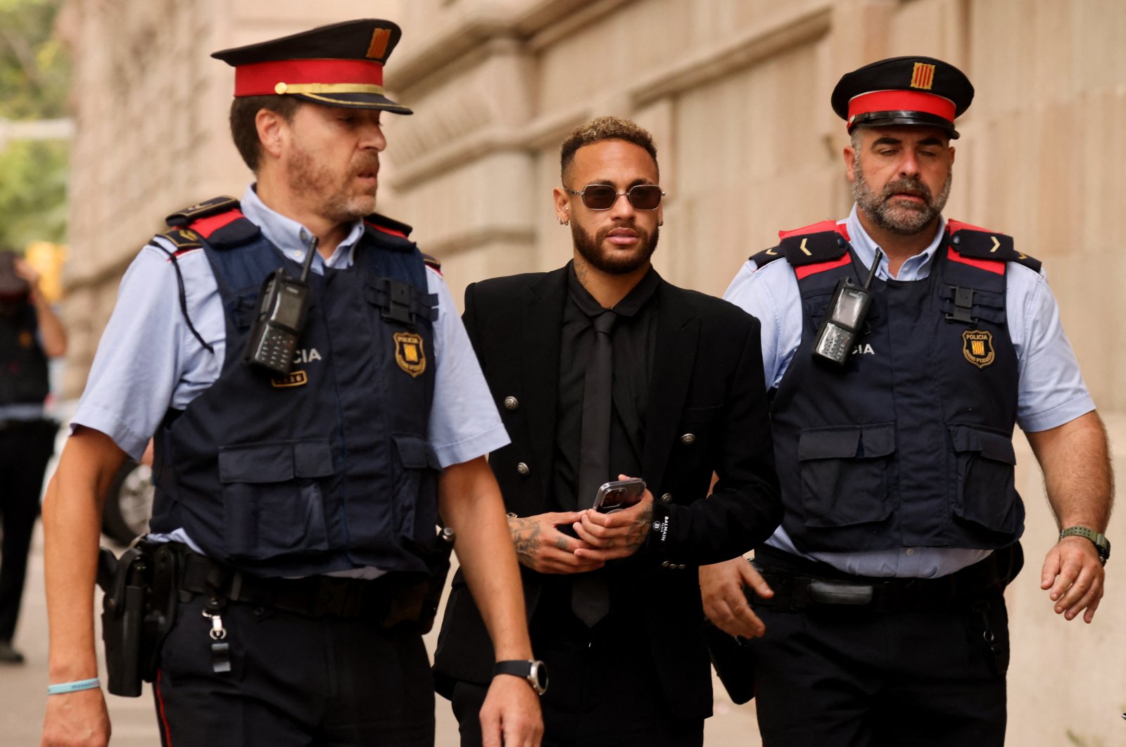 Brazil&#039;s Neymar leaves court after standing trial on fraud and corruption charges over the transfer to FC Barcelona from Santos in 2013. Barcelona, Spain, Oct. 17, 2022. (REUTERS Photo)