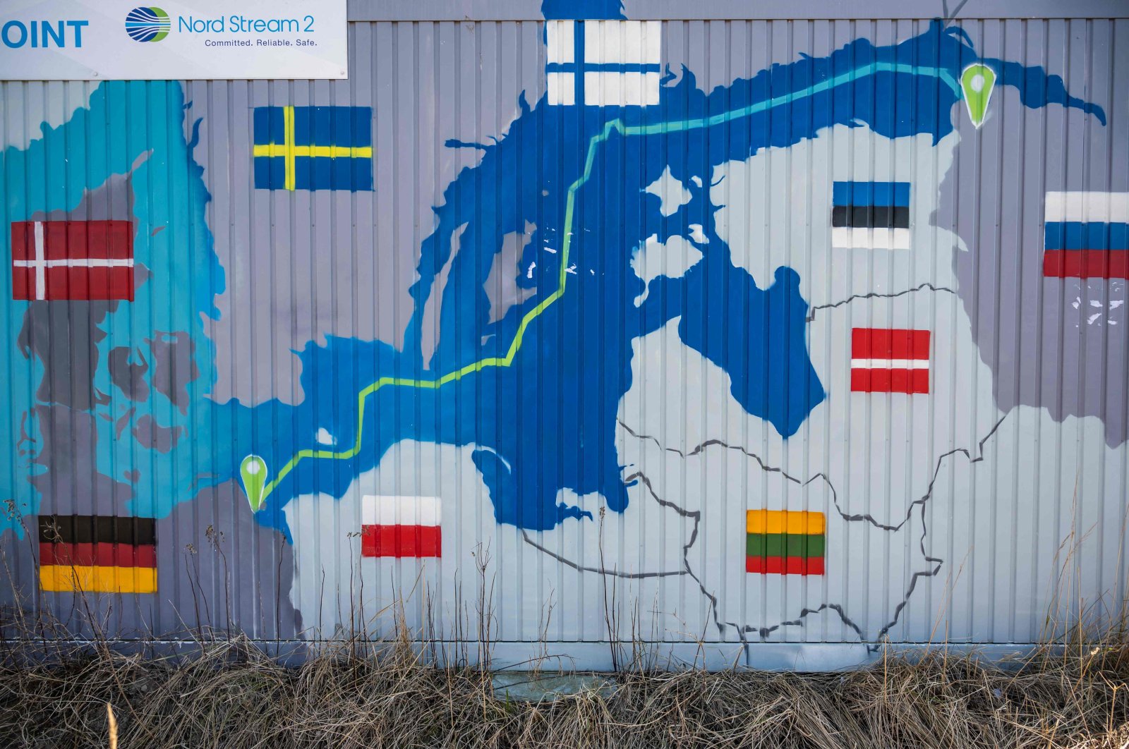 A container decorated with a map showing the position of the Nord Stream 2 gas pipeline is seen in Lubmin&#039;s industrial park, northeastern Germany, March 1, 2022. (AFP Photo)
