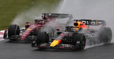 Red Bull driver Max Verstappen of the Netherlands (R) and Ferrari driver Charles Leclerc of Monaco compete during the Japanese Formula One Grand Prix at the Suzuka Circuit, Suzuka, Japan, Oct. 9, 2022. (AP Photo)