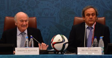 Former FIFA President Joseph S. Blatter and UEFA President Michel Platini look on during the Team Seminar ahead of the Preliminary Draw of the 2018 FIFA World Cup at the Corinthia Hotel. Saint Petersburg, Russia, July 25, 2015. (Getty Photo)