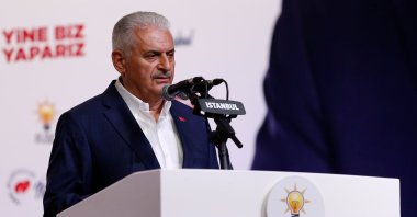 Binali Yıldırım talks to media at his party's Istanbul headquarters in Istanbul, June 23, 2019. (Reuters File Photo)