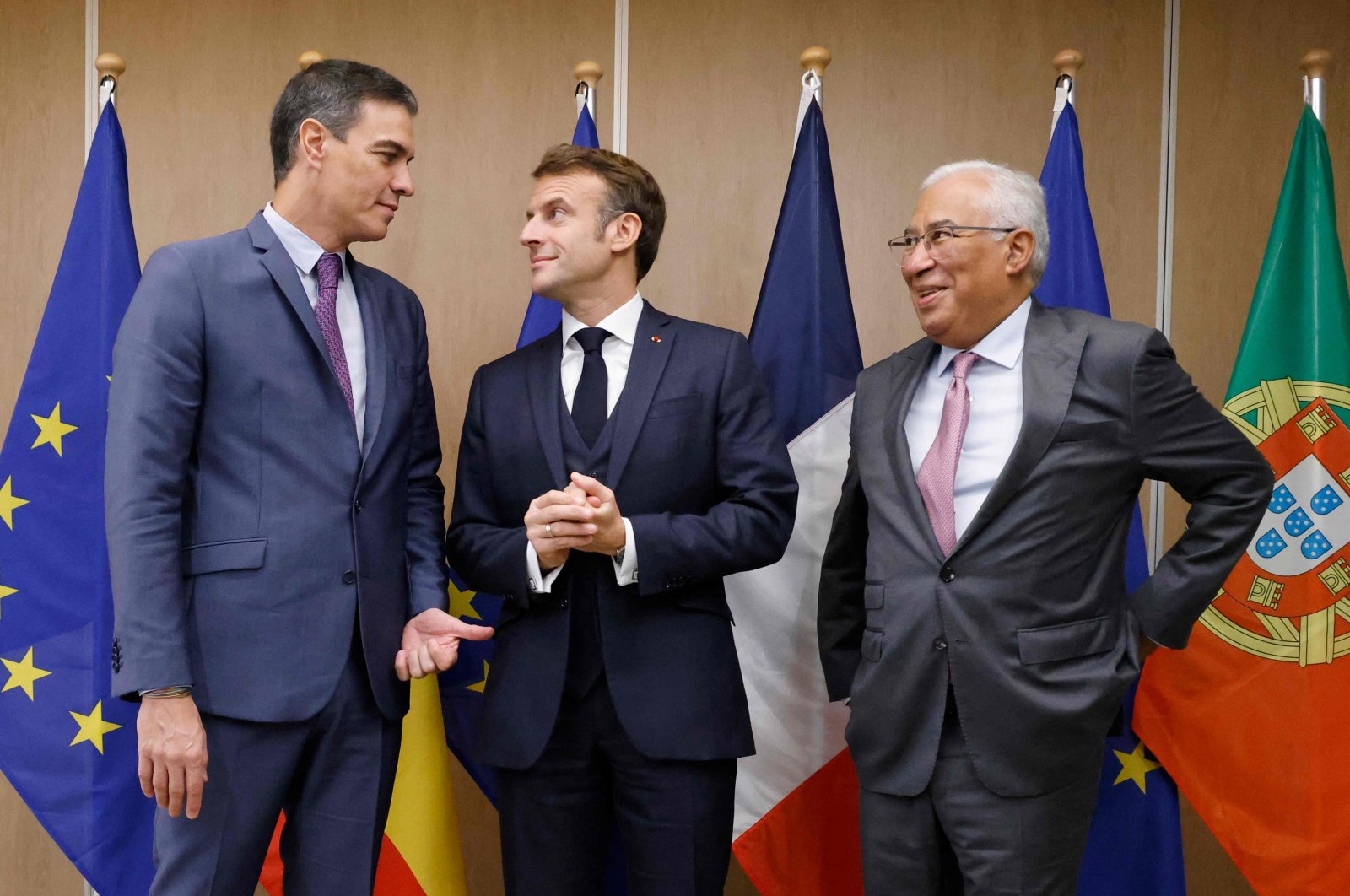 French President Emmanuel Macron (C), Spain&#039;s Prime Minister Pedro Sanchez (L) and Portugal&#039;s Prime Minister Antonio Costa pose ahead of their meeting on the sideline of an EU leaders Summit in Brussels, Belgium, Oct. 20, 2022. (AFP Photo)