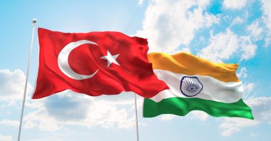 The Turkish and Indian flags wave in the wind. (Shutterstock Photo)