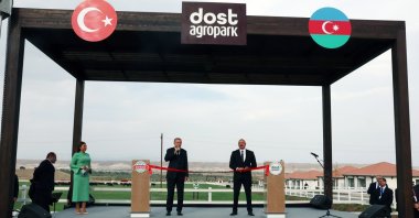 President Recep Tayyip Erdoğan (L) and Azerbaijani President Ilham Aliyev (R) are in the stage during the inauguration ceremony of Zangilan International Airport, Zangilan, Azerbaijan, Oct. 20, 2022. (AA Photo)