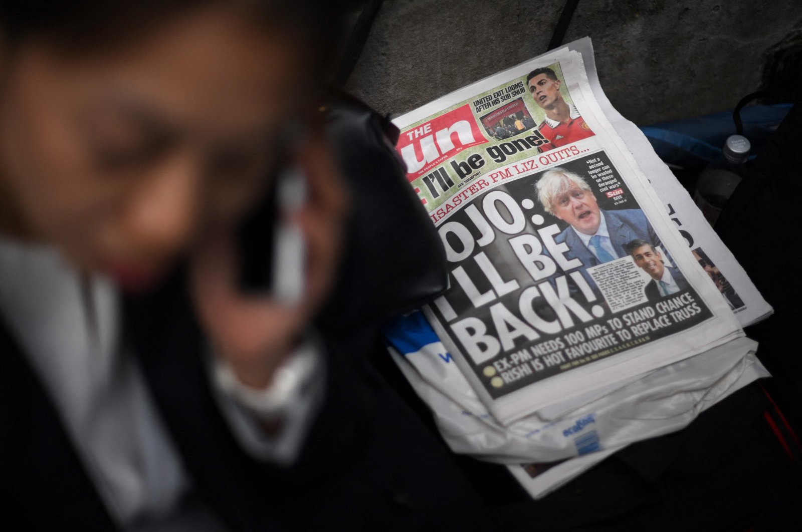A copy of The Sun newspaper featuring former PM Boris Johnson lies on the floor outside 10 Downing Street, London, England, Oct. 21, 2022. (AFP Photo)