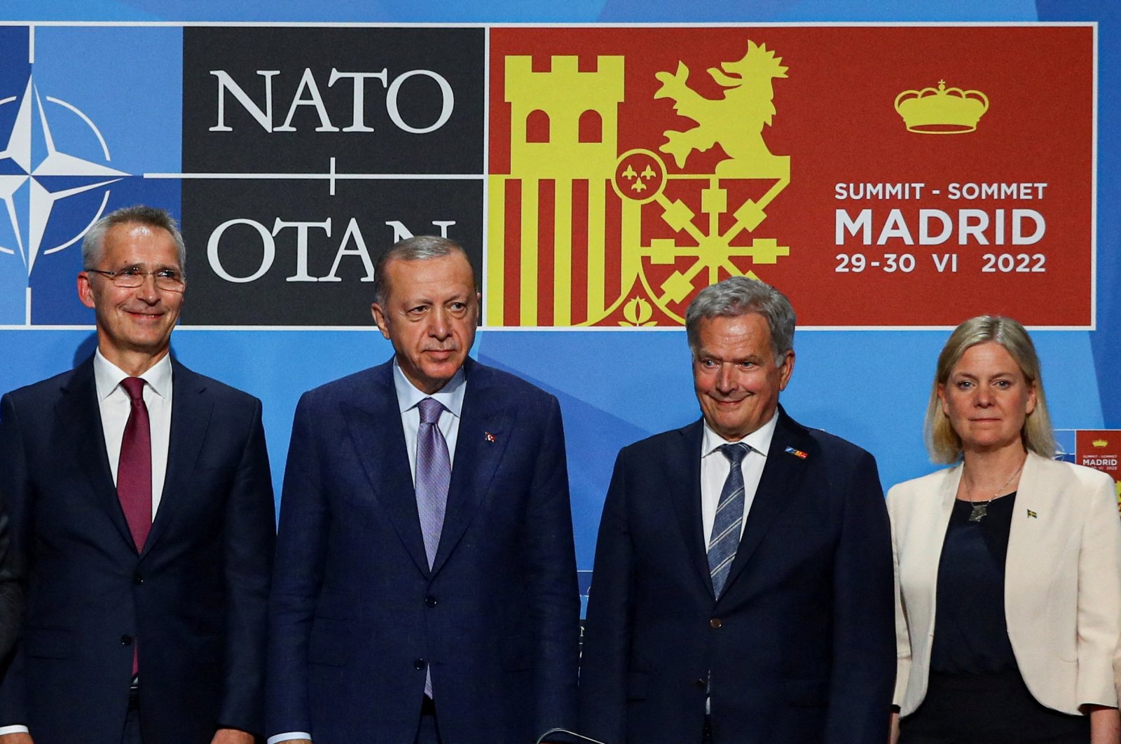 NATO Secretary-General Jens Stoltenberg (L), President Recep Tayyip Erdoğan, Finland&#039;s President Sauli Niinisto (C-R) and Sweden&#039;s Prime Minister Magdalena Andersson (R) pose after signing a document during a NATO summit in Madrid, Spain, June 28, 2022. (REUTERS Photo)