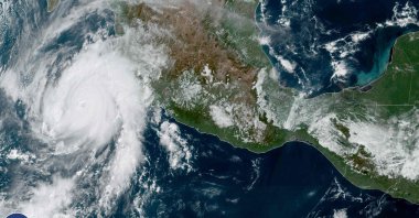 This satellite image from the National Oceanic and Atmospheric Administration shows Hurricane Roslyn approaching Mexico's Pacific coast on Oct. 22, 2022. (NOAA/GOES Handout via AFP)