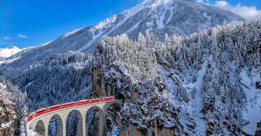 The Glacier Express is an express train in the central Swiss Alps that connects the two major mountain resorts of Zermatt and St. Moritz in Switzerland. (Shutterstock Photo)