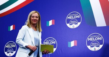 Leader of Brothers of Italy Prime Minister Giorgia Meloni looks on as she walks onstage at the party&#039;s election night headquarters, Rome, Italy, Sept. 26, 2022. (Reuters Photo)