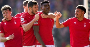 Nottingham Forest players celebrate a goal in a Premier League match against Liverpool, Nottingham, the U.K., Oct. 22, 2022. (AP Photo)