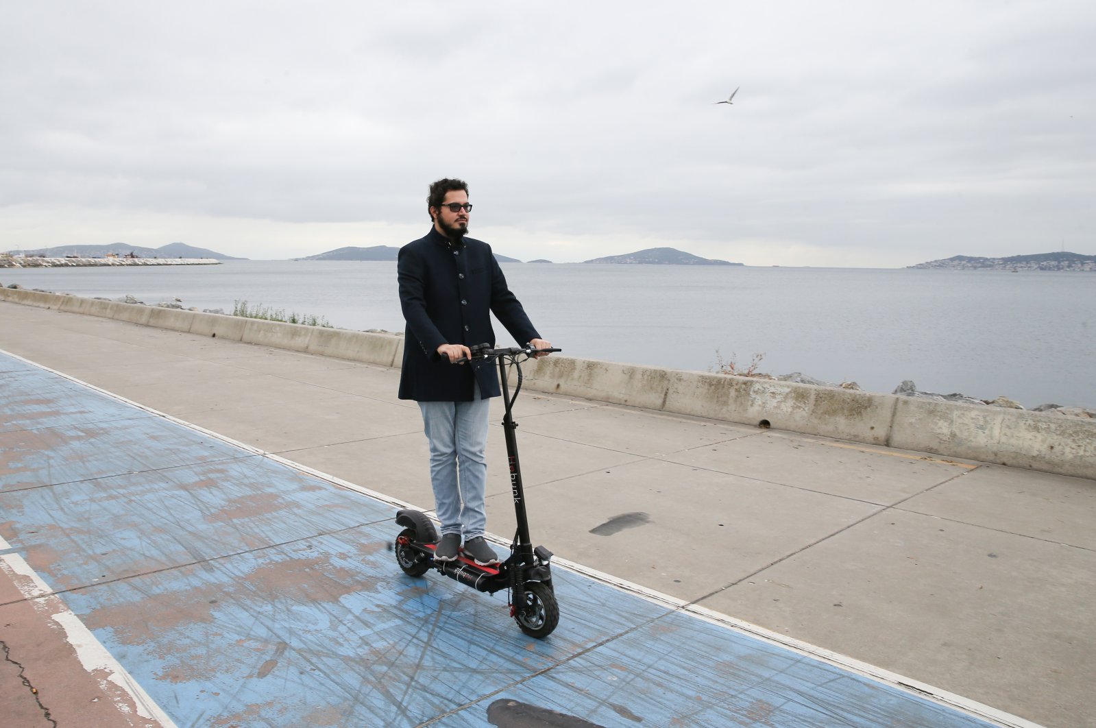 Erhan Demircioğlu rides a hydrogen-powered scooter, in Istanbul, Türkiye, Oct. 23, 2022. (AA Photo)