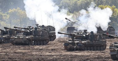 Soldiers conduct an artillery live-fire drill at an Army training range on the western section of the inter-Korean border Paju, South Korea, Oct. 17, 2022. (EPA Photo)