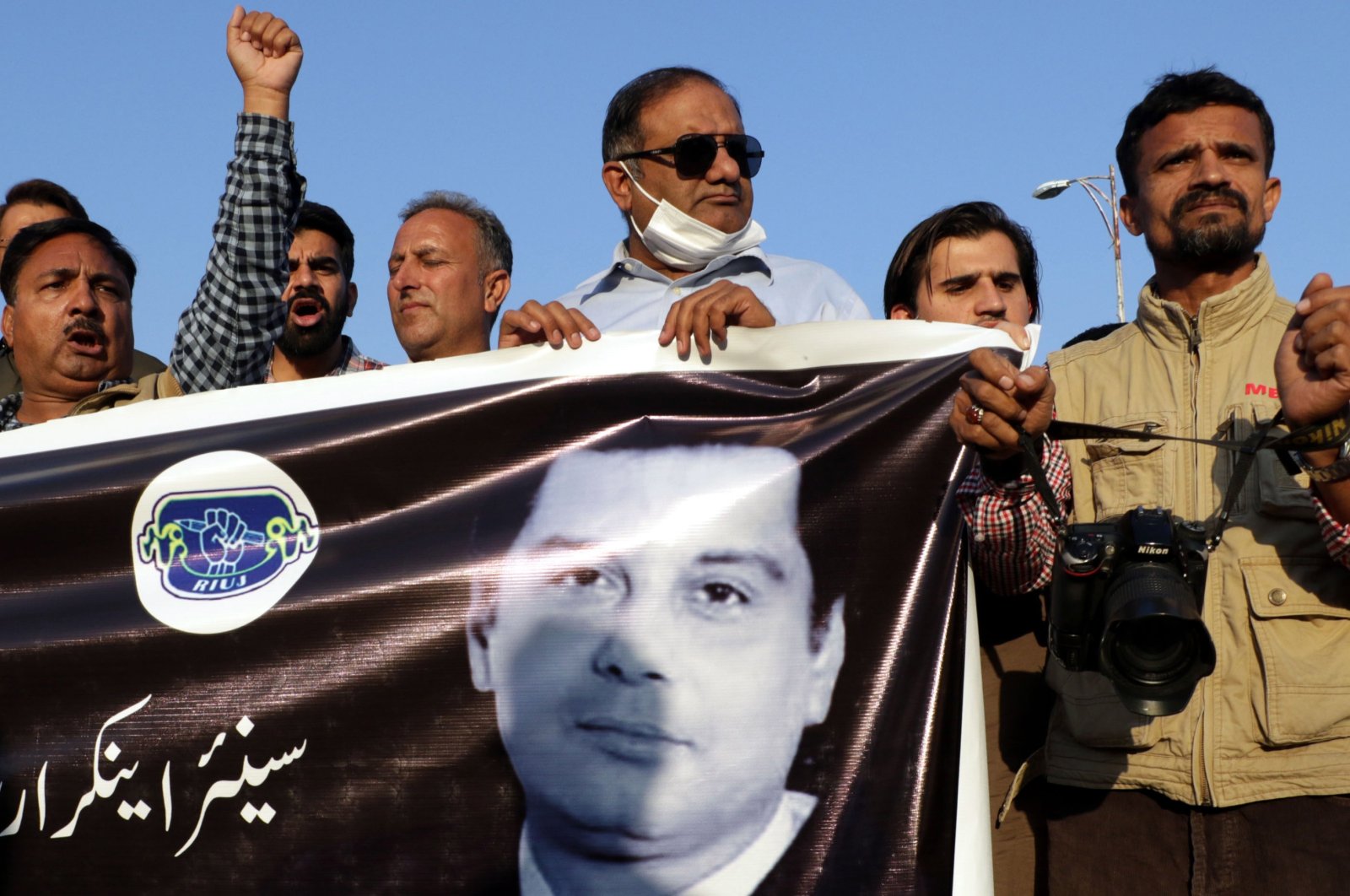 Journalists shout slogans during a protest following the death of veteran Pakistani journalist Arshad Sharif, Islamabad, Pakistan, Oct. 24, 2022. (EPA Photo)