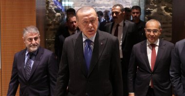President Recep Tayyip Erdoğan, accompanied by Treasury and Finance Minister Nureddin Nebati (L), arrives at a meeting in Istanbul, Türkiye, Oct. 3, 2022. (Reuters Photo)