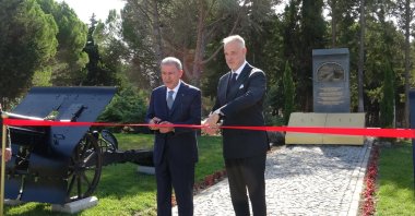 Ministers Hulusi Akar (L) and Kristof Szalay-Bobrovniczky cut the ribbon, in Çanakkale, western Türkiye, Oct. 25, 2022. (DHA Photo) 