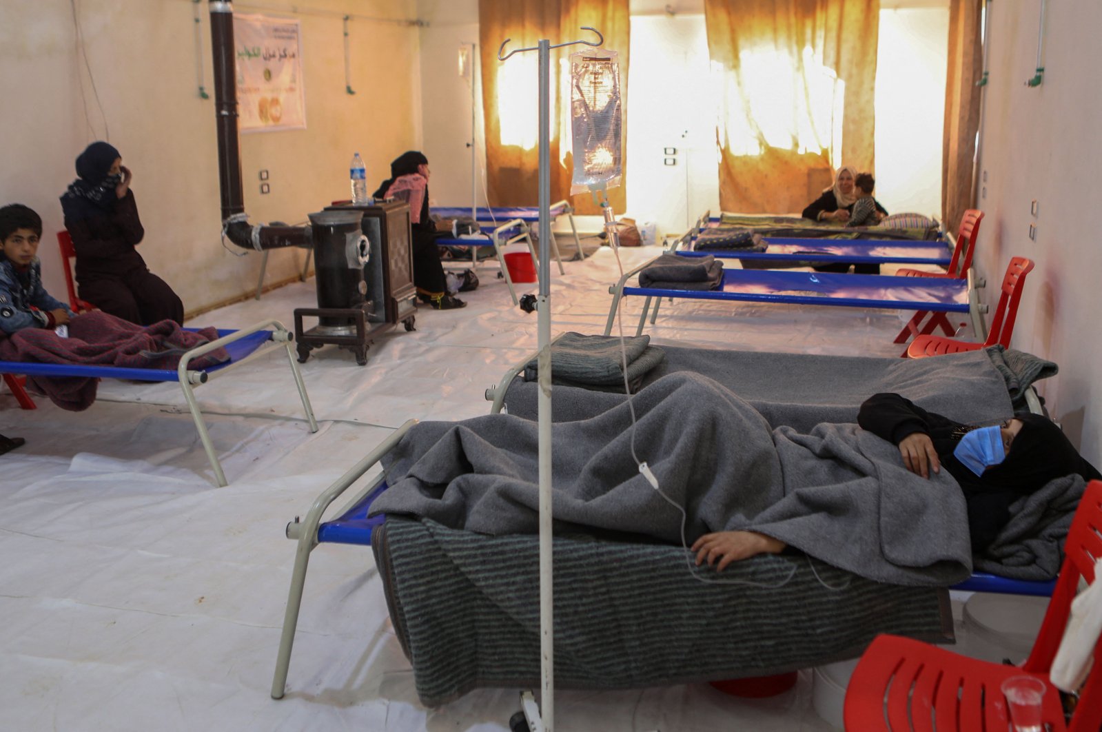 Patients receive treatment at a recently-opened medical center for cholera cases in the Syrian town of Darkush, on the outskirts of the opposition-held northwestern province of Idlib, Oct. 22, 2022. (AFP Photo)